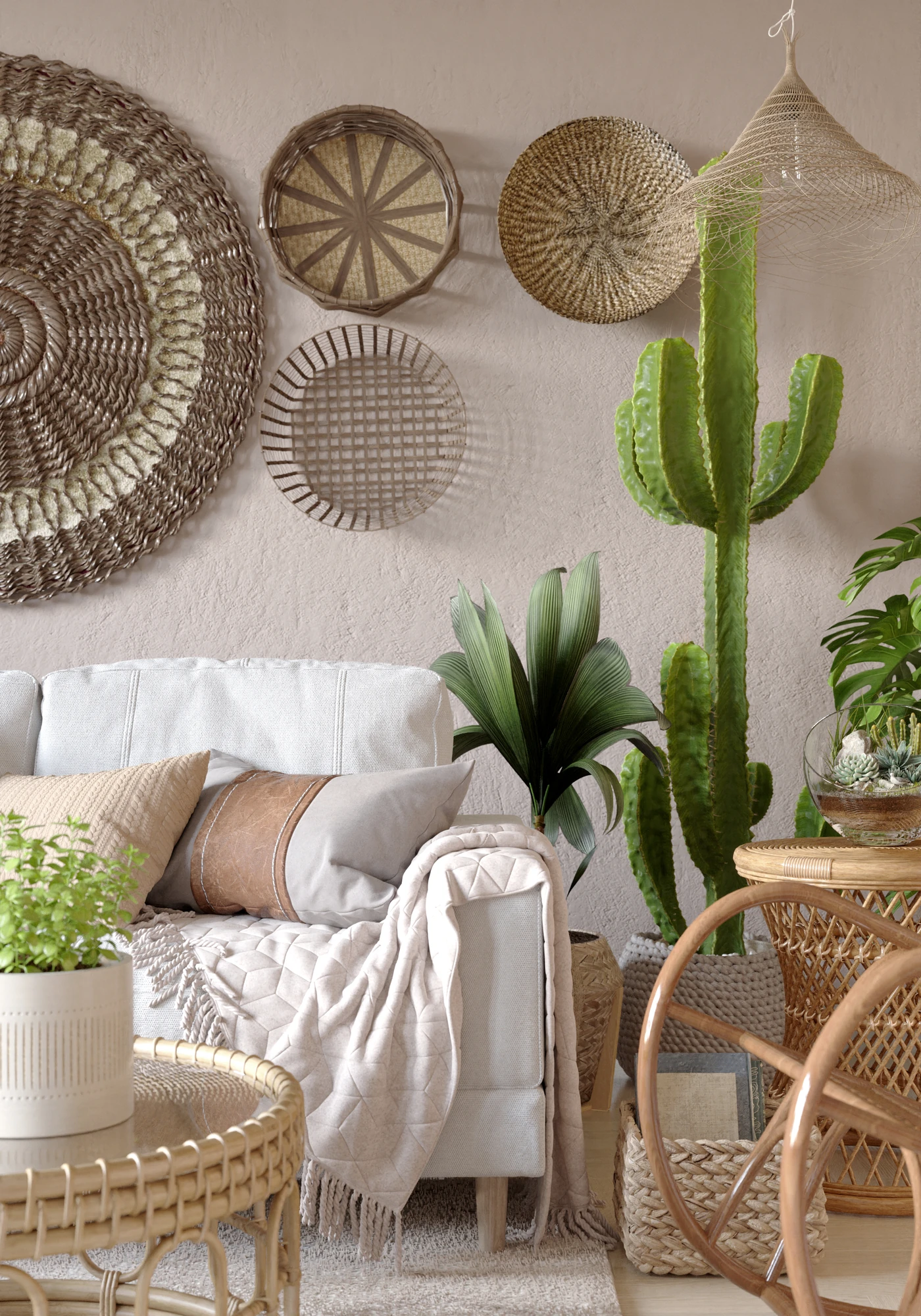 White sofa, woven wall baskets and tall cactus in a daylit boho living room