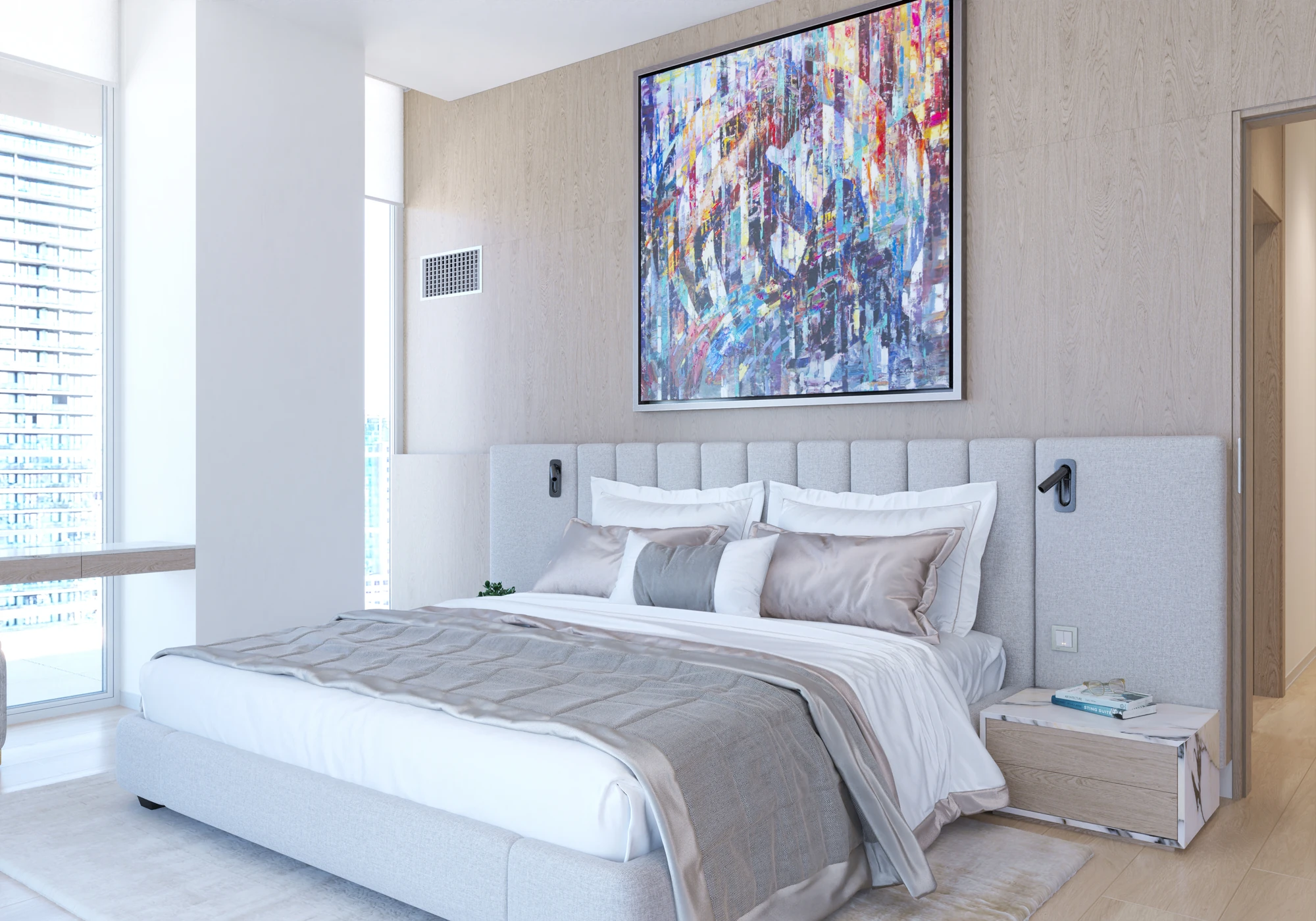 Contemporary Primary Suite — bedroom with upholstered bed and colorful artwork in daylight
