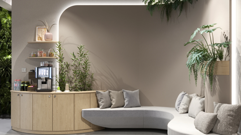 Curved Form Salon & Spa — waiting area with curved sofa, coffee station and greenery