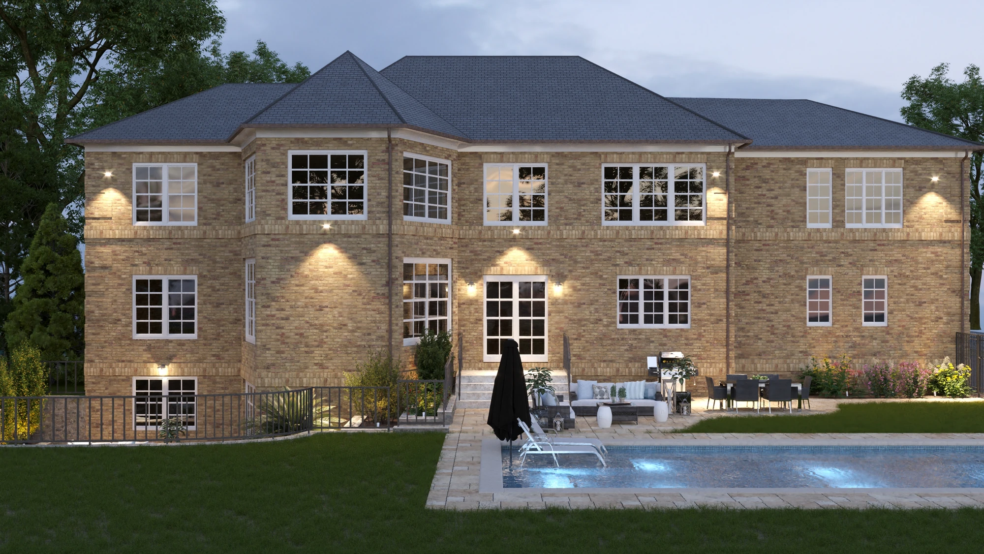 Pool & Terrace Extension — rear facade and pool at dusk with exterior lights illuminated