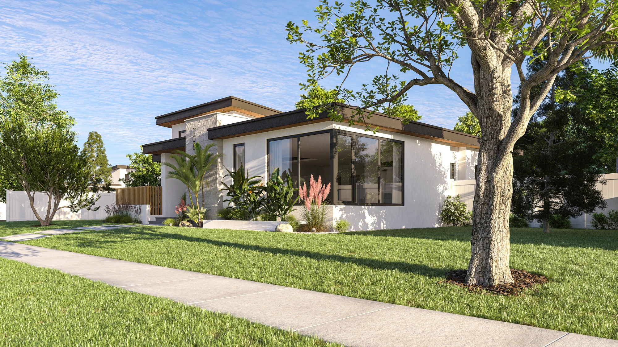 Stone Entry Residence — corner facade with large windows and tree-lined lawn