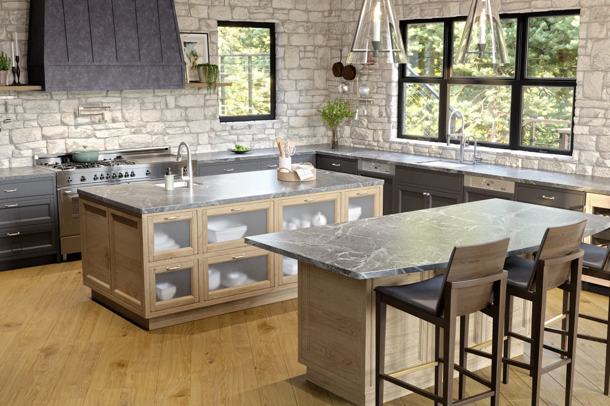 Stone & Timber Residence — kitchen with stone walls and two wood islands